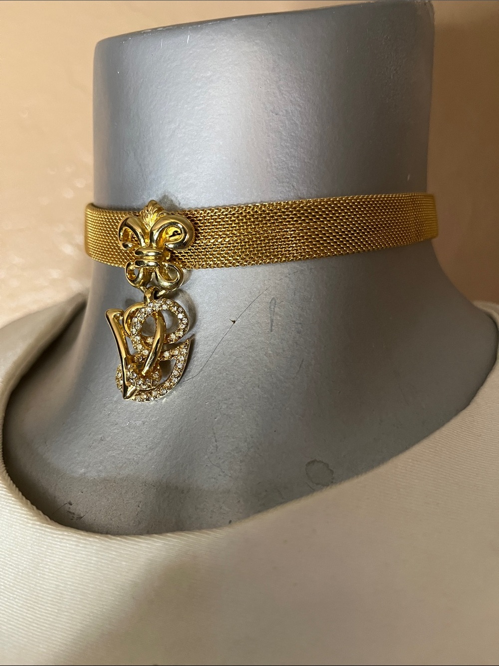 Vintage Valentino Garavani Gold Mesh Choker with Crystal-Embellished Logo Charm.